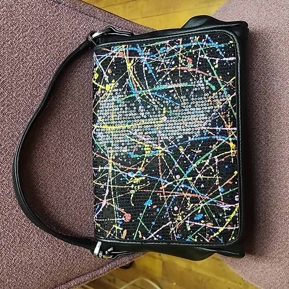 Coco + Carmen paint splash purse